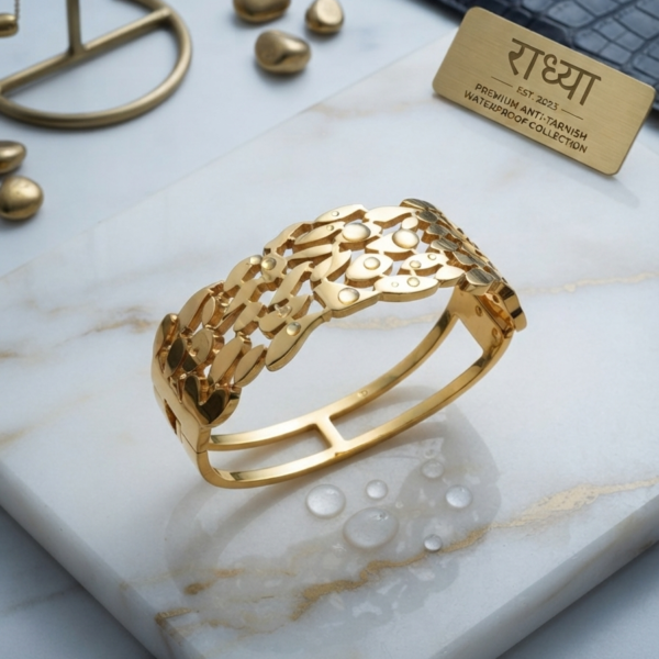 Elegant gold finish cutwork leaf motif bracelet.