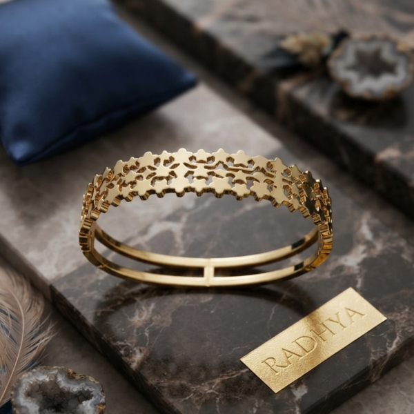 Radiant gold star motif cutwork bracelet
