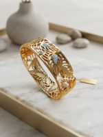 Golden cutwork leaf motif heritage kada bracelet