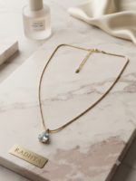 Elegant gold chain with teardrop pendant