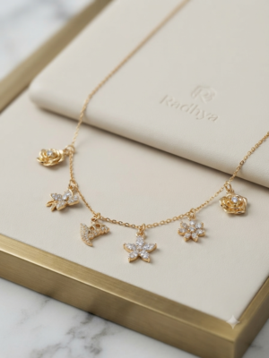 Dainty gold chain with sparkling floral charms