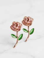 Charming black rose earrings with green leaves.