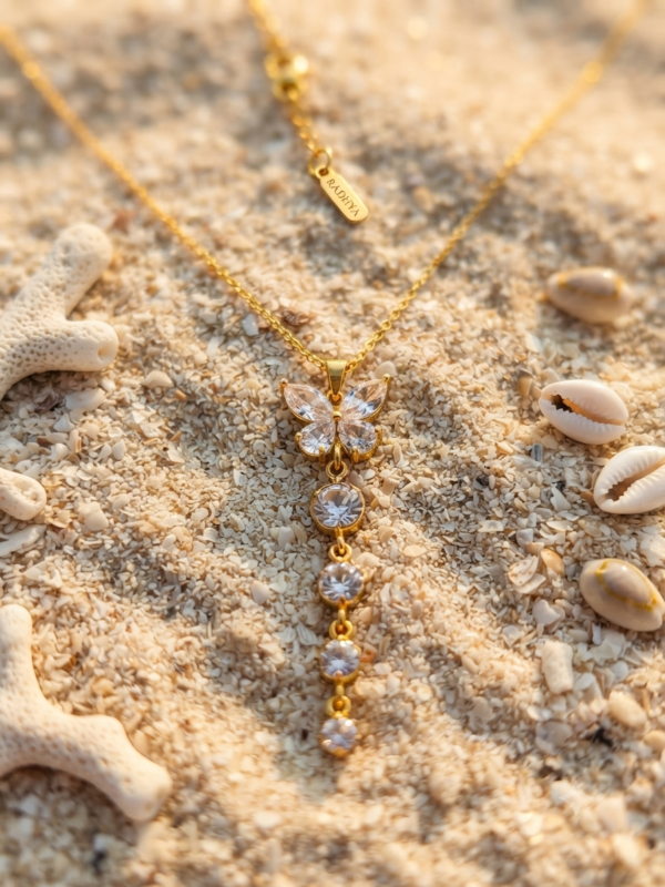Gold butterfly pendant necklace with sparkling stones