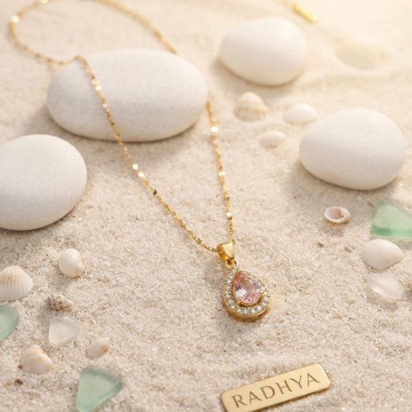 Elegant gold teardrop pink stone pendant necklace