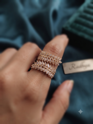 Elegant dual leaf band ring with sparkling AD stones.