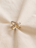 Elegant gold finish AD stone crisscross ring